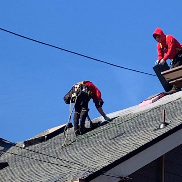 Valentine Roofing crew on roof project
