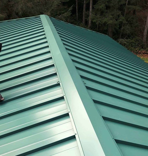 A new standing seam metal panel roof