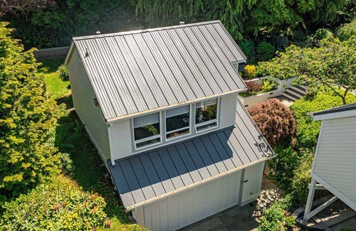 Seattle standing seam meatal panel replacement project