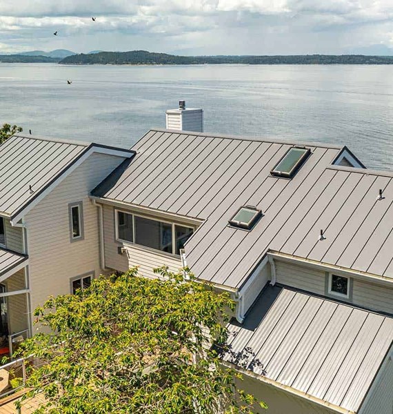 Metal standing seam panel roof installation in Seattle, Washington