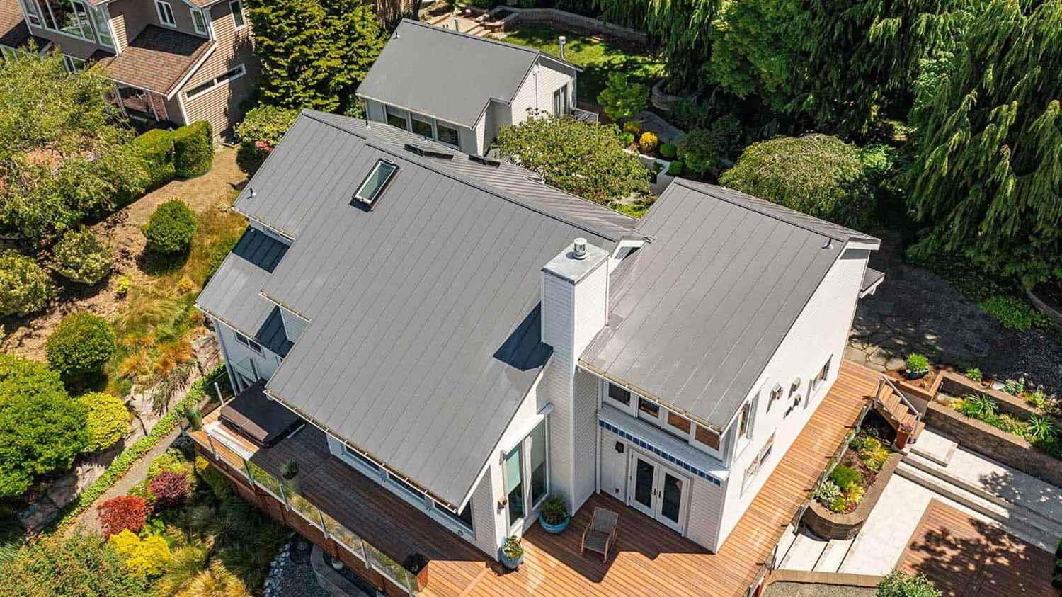 Gray metal roof installation project in Seattle, Washington