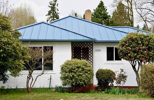 Blue Standing Seam Metal Panel Roof Installation in Tukwila, Washington