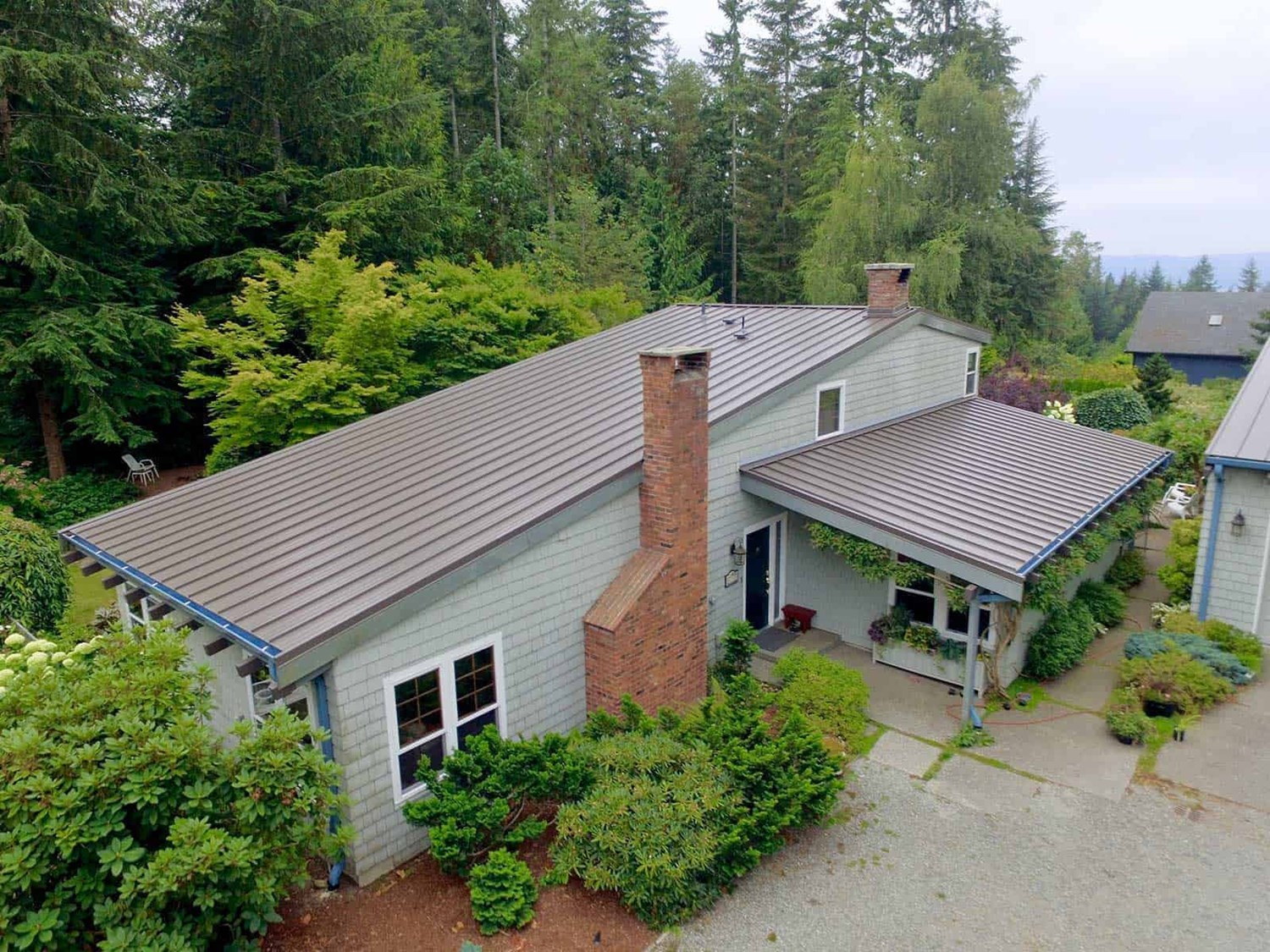 Poulsbo, Washington Standing Seam Metal Panel in Weathered Copper Roof Replacement