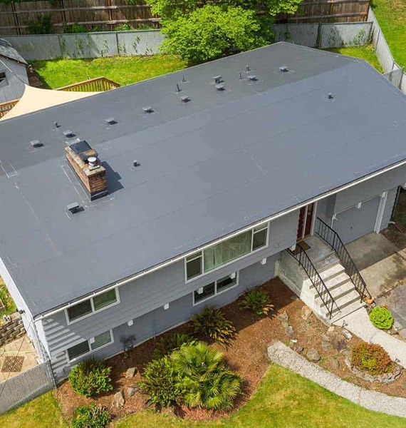 A dark gray PVC single ply roof installed in Seattle, WA 