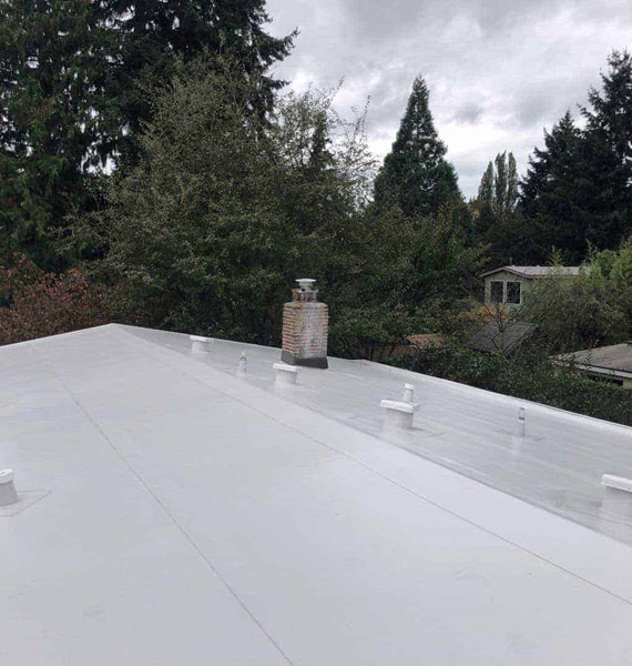 A white single ply PVC roof installed in SeaTac, WA 