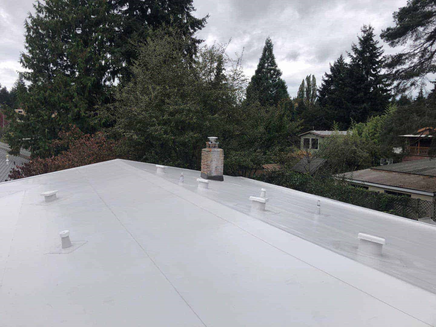 A white single ply PVC roof installed in SeaTac, WA 