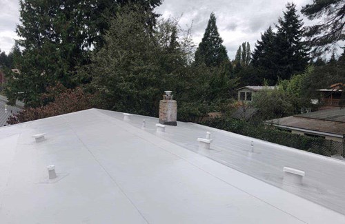 A white single ply PVC roof installed in SeaTac, WA 