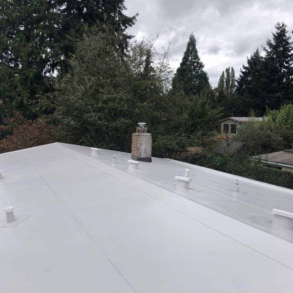 A white single ply PVC roof installed in SeaTac, WA