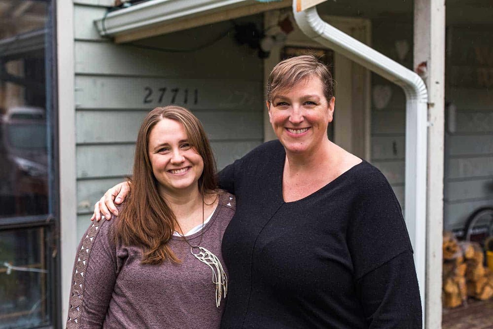 Jenn Linstad standing with her daughter