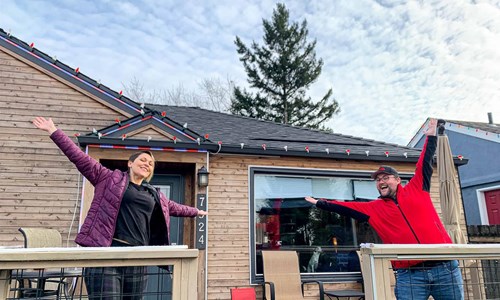 Tasha and a Valentine Roofing employee