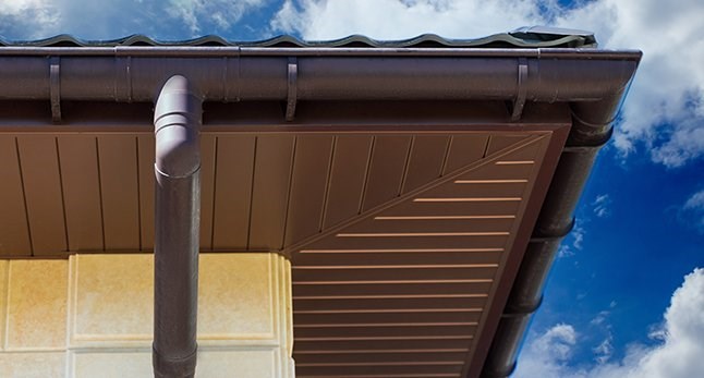 Rounded, brown butters and downspouts
