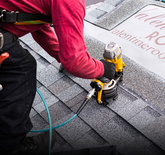 Shingle roof repair on home in Seattle, WA