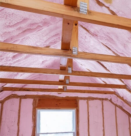 checking attic ventilation during roof inspection in Washington